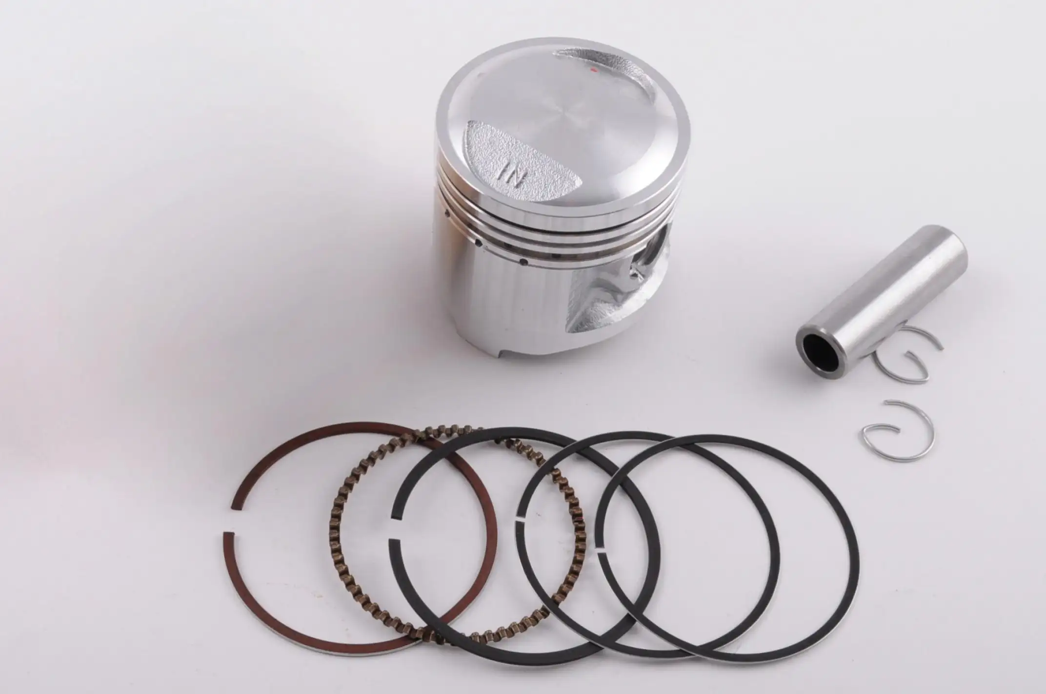 Поршень   4T CB/CG   Ø56,50mm, p-15   (125/140cc STD)   KOMATCU   (mod.A)